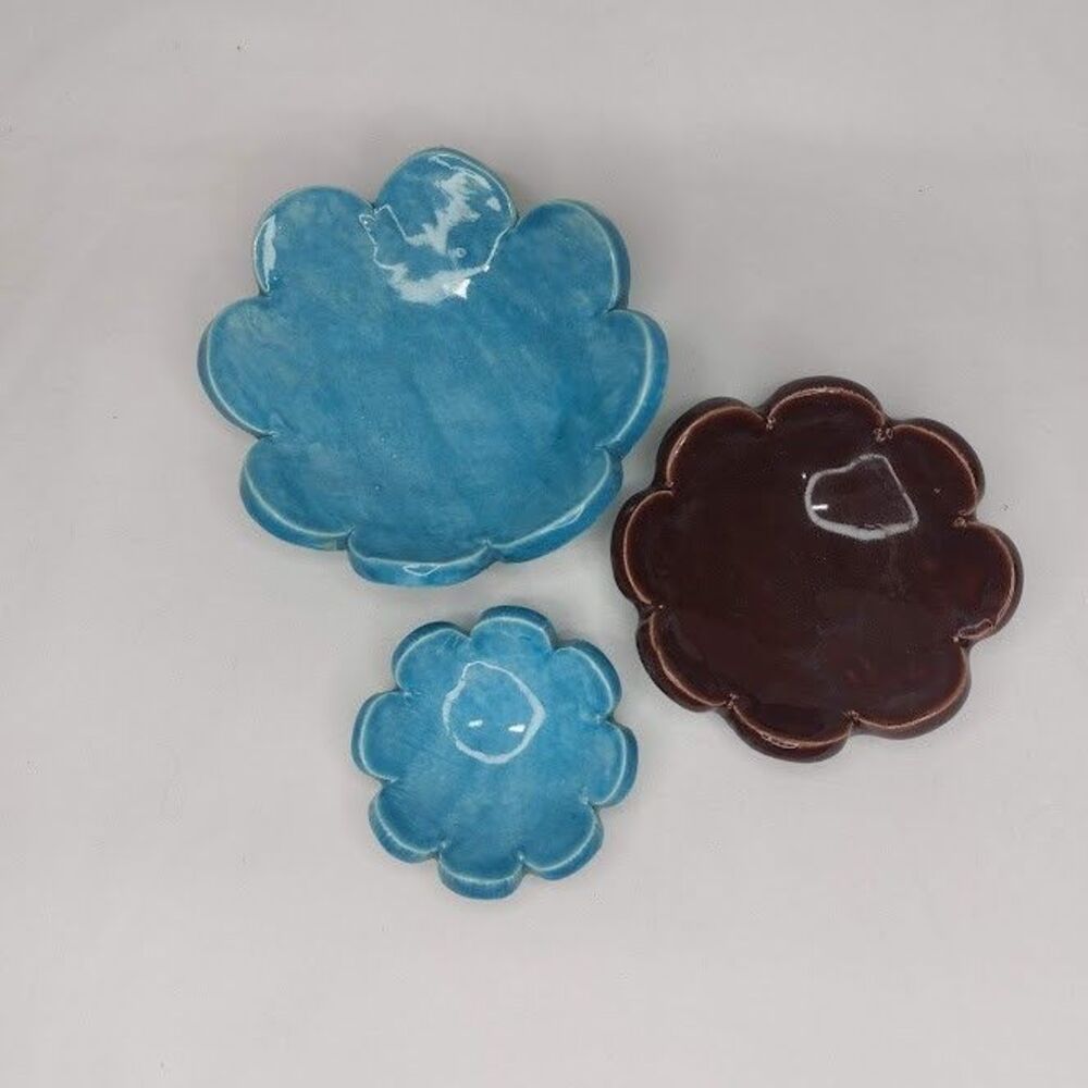 Ceramic flower-shaped nesting trinket dishes in vibrant turquoise & brown glaze